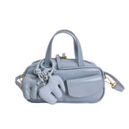 playful mini handbag with charming animal charm