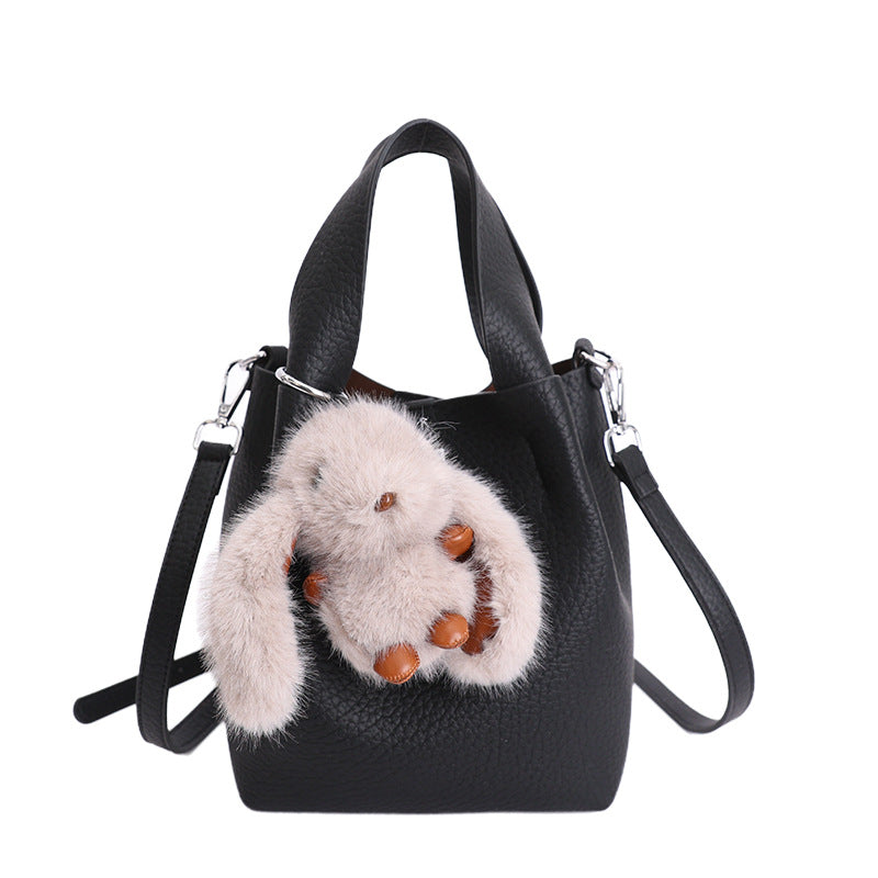 Women’s mini handbag with detachable plush pendant