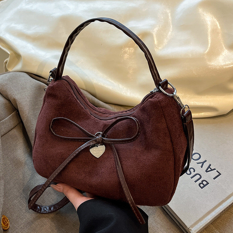 mini handbag with elegant bow design