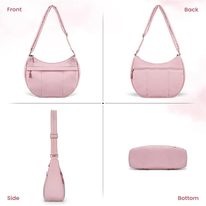 Fashionable shoulder bag with padded shoulder strap and multiple compartments