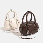 Ladies mini handbag with playful drawstring and elegant accents