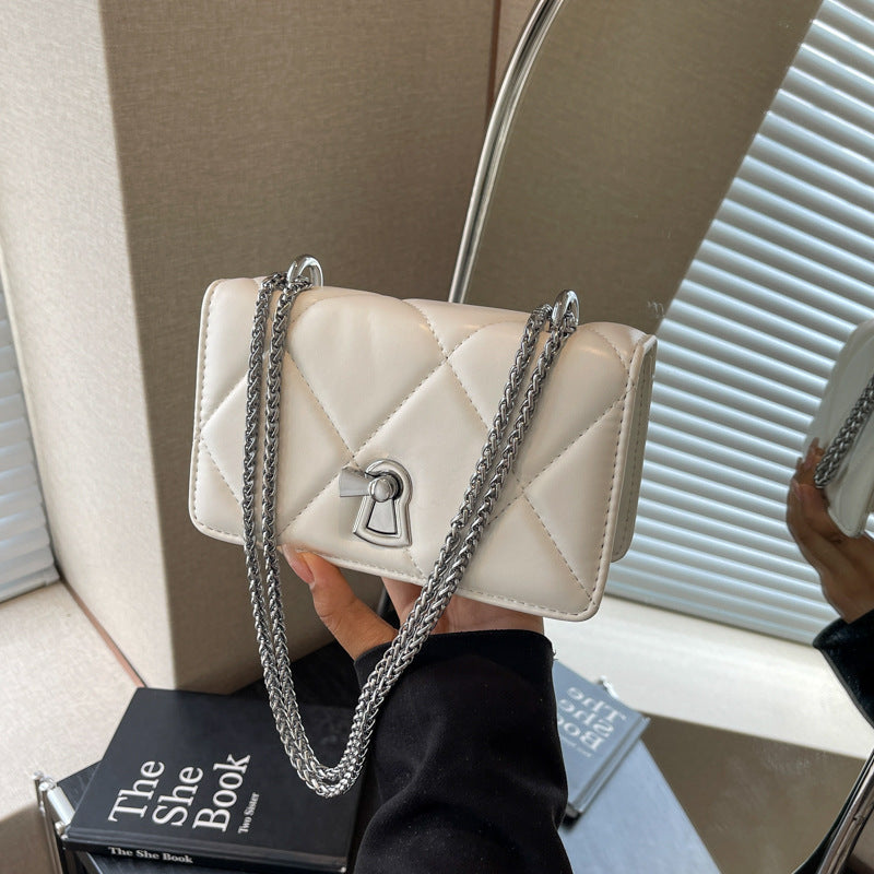 Ladies elegant mini handbag with striking quilted pattern