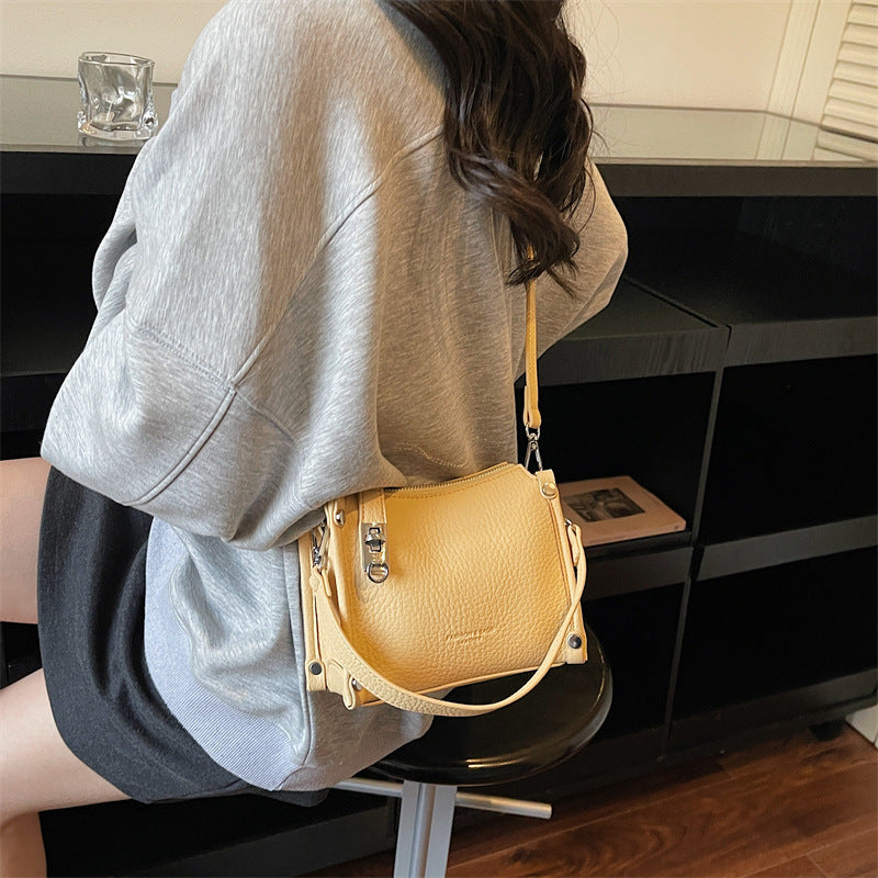 practical mini handbag with adjustable shoulder strap