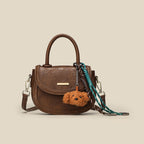 mini handbag with playful detail and high-quality synthetic leather