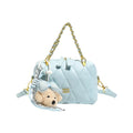 stylish mini handbag with playful animal pendant