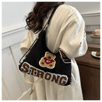 Shoulder bag in playful bear pattern