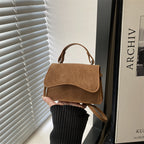 Ladies mini handbag with detachable carrying handle