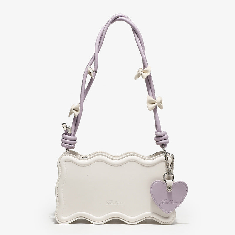 mini handbag with creative wave pattern and playful pendant