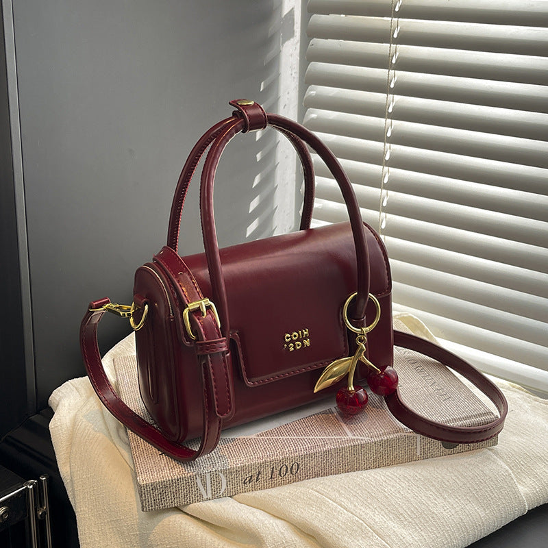 Ladies Mini-Handbag with Elegant Structure and Charming Pendant