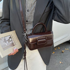 mini handbag with detachable shoulder strap and modern design