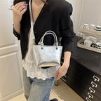 elegant mini handbag with textured design and detachable shoulder strap
