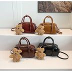 mini handbag with charming bear pendant