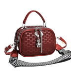 Women’s Mini Handbag with unique embossing and detachable shoulder strap