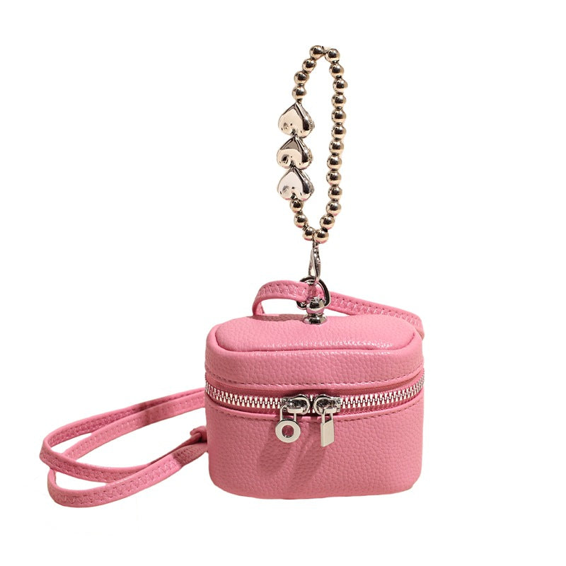 mini handbag with luxurious chain pendant