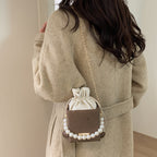 Women stylish mini handbag with drawstring and pearl accent Nord bags
