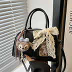 mini handbag with cute plush pendant and delicate bow decoration