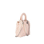 mini handbag with striking cinched design and pearl accents