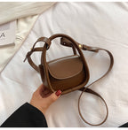Ladies mini handbag with elegant chain accent