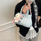 Ladies Mini Handbag with Playful Plush Pendant