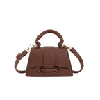 mini handbag with textured leather and stylish closure