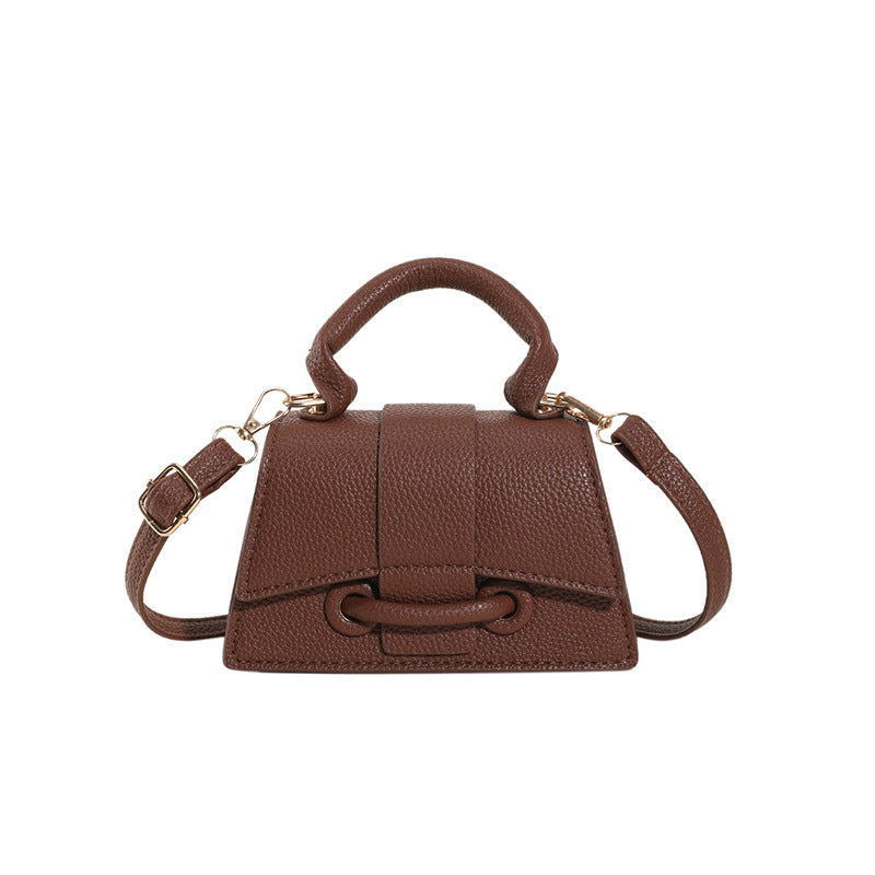 mini handbag with textured leather and stylish closure