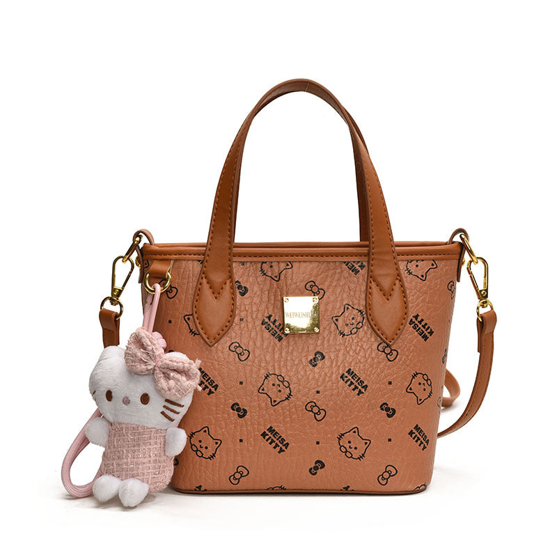 Women’s mini handbag in a charming design with removable pendant