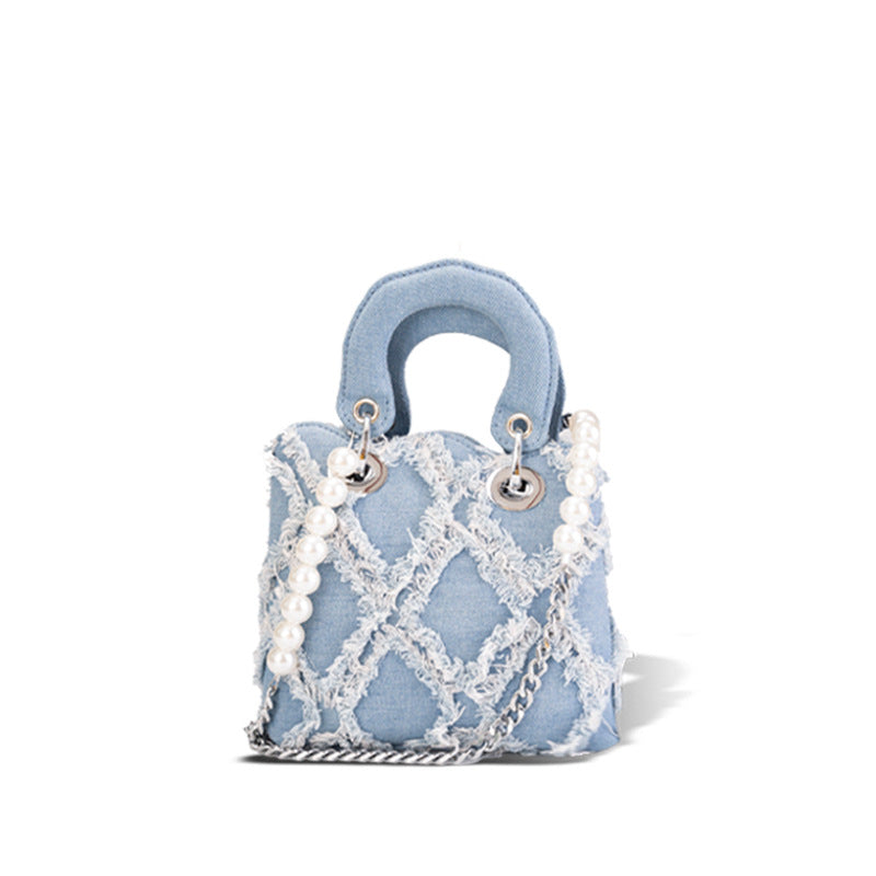 mini handbag with striking cinched design and pearl accents