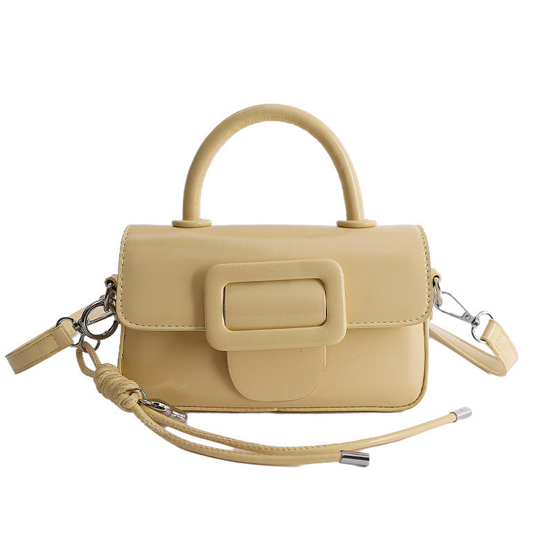 mini handbag with decorative snap closure