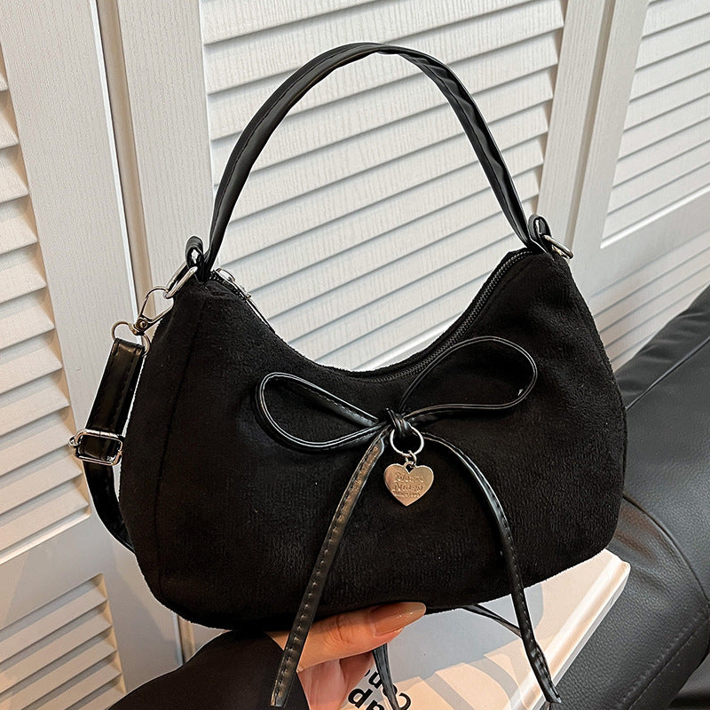 mini handbag with elegant bow design
