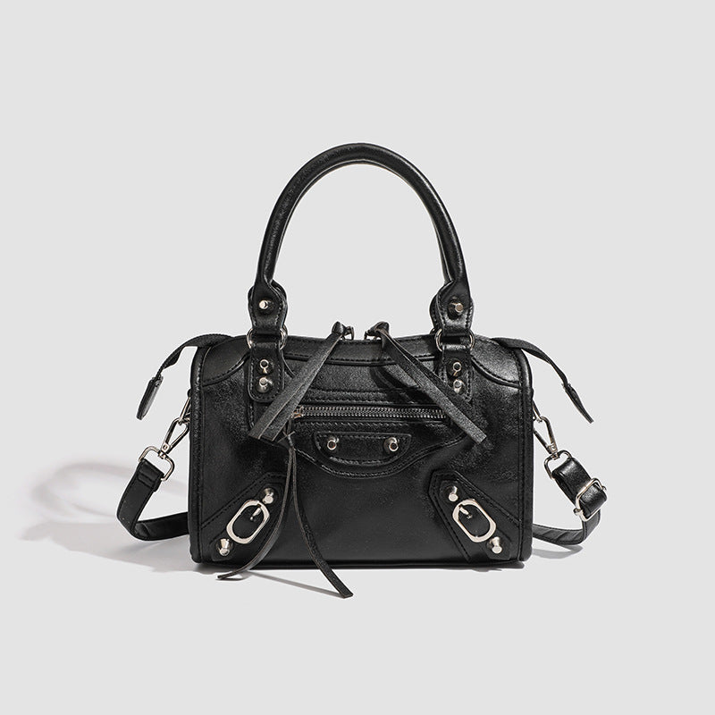Ladies Mini handbag with decorative metal accents and detachable shoulder strap Nord Bags