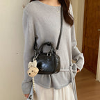 Women’s mini handbag with detachable plush pendant