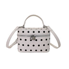 Women’s mini handbag with playful design and elegant accents