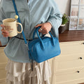 Women’s mini handbag with textured faux leather and elegant design