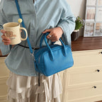Women’s mini handbag with textured faux leather and elegant design