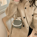 Women stylish mini handbag with drawstring and pearl accent Nord bags