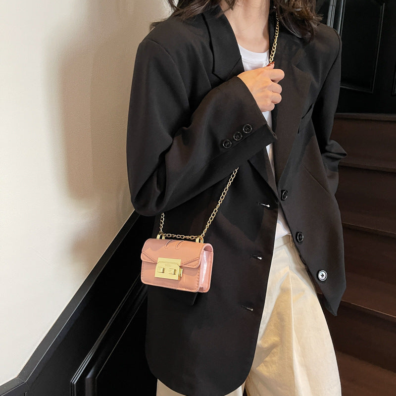 elegant mini handbag with gold closure mechanism
