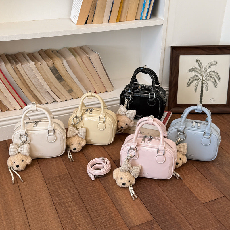 Women’s mini handbag with detachable plush pendant