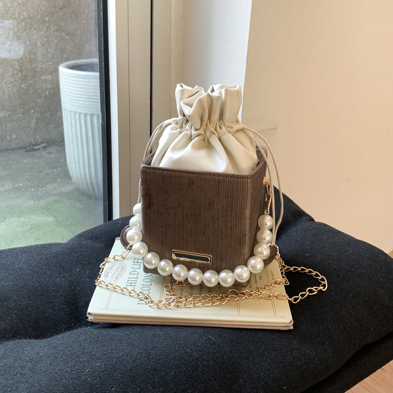 Women stylish mini handbag with drawstring and pearl accent Nord bags