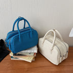 Women’s mini handbag with textured faux leather and elegant design
