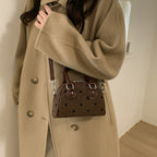 mini handbag made of high-quality material with a textured surface