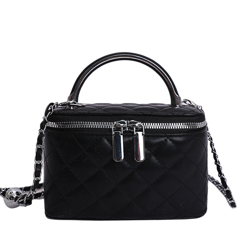 mini handbag with gold chain accent and textured design