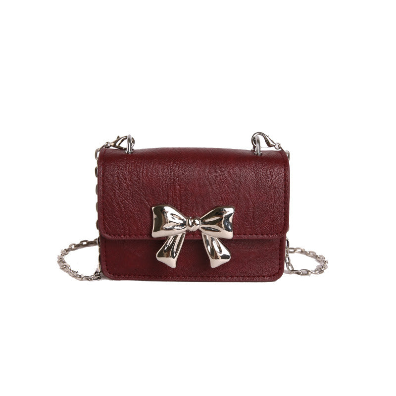 Charming Bow-Embellished Mini Handbag