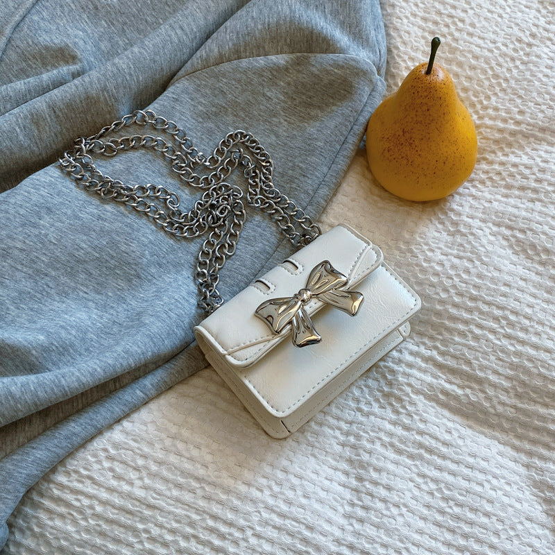 Mini Handbag with Shimmering Bow Closure