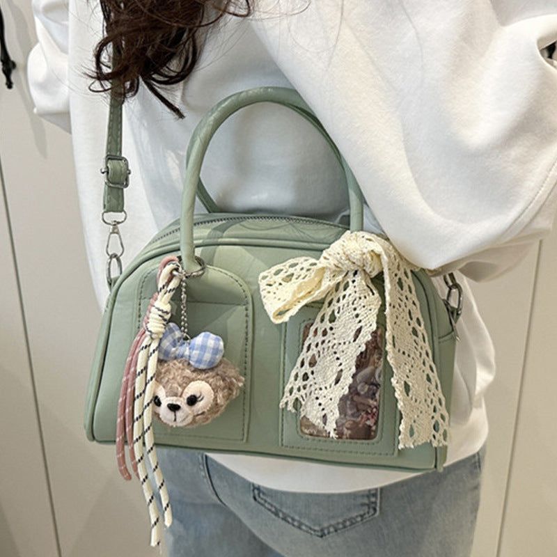 mini handbag with cute plush pendant and delicate bow decoration
