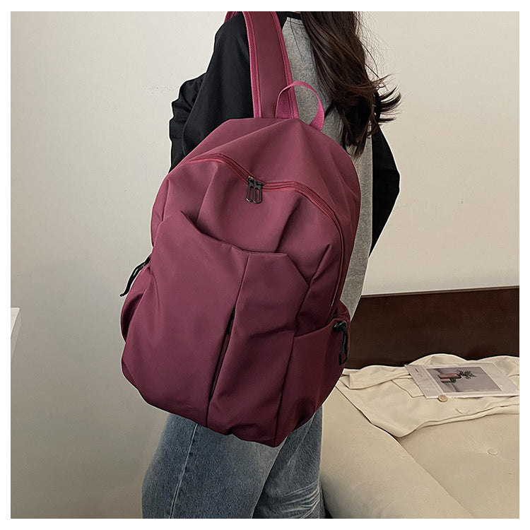 Backpack with ergonomic design and multifunctional compartments
