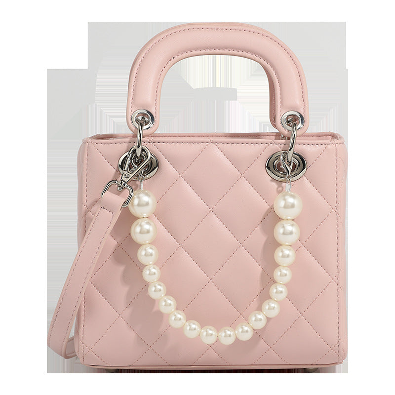 Women’s mini handbag with pearl-embellished chain and quilted design