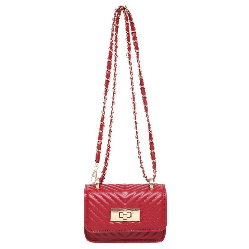 mini handbag with quilted design and golden closure
