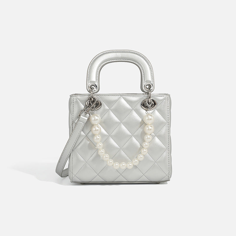 Women’s mini handbag with pearl-embellished chain and quilted design