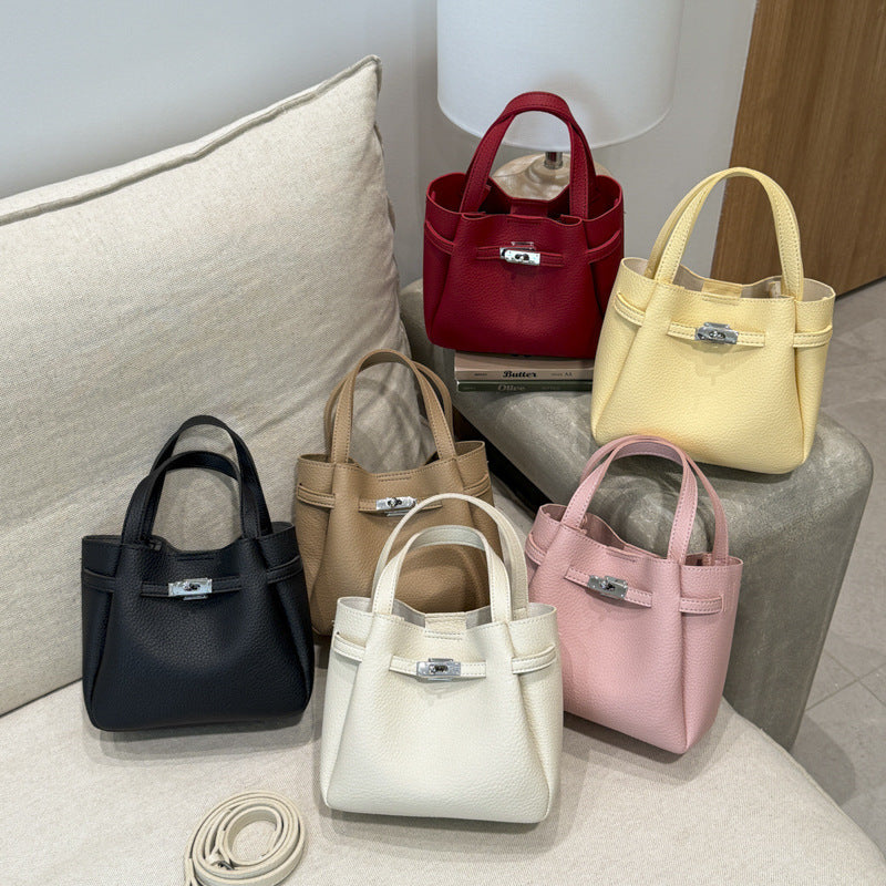 mini handbag with fluffy pendant