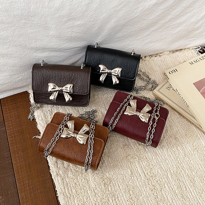 Charming Bow-Embellished Mini Handbag
